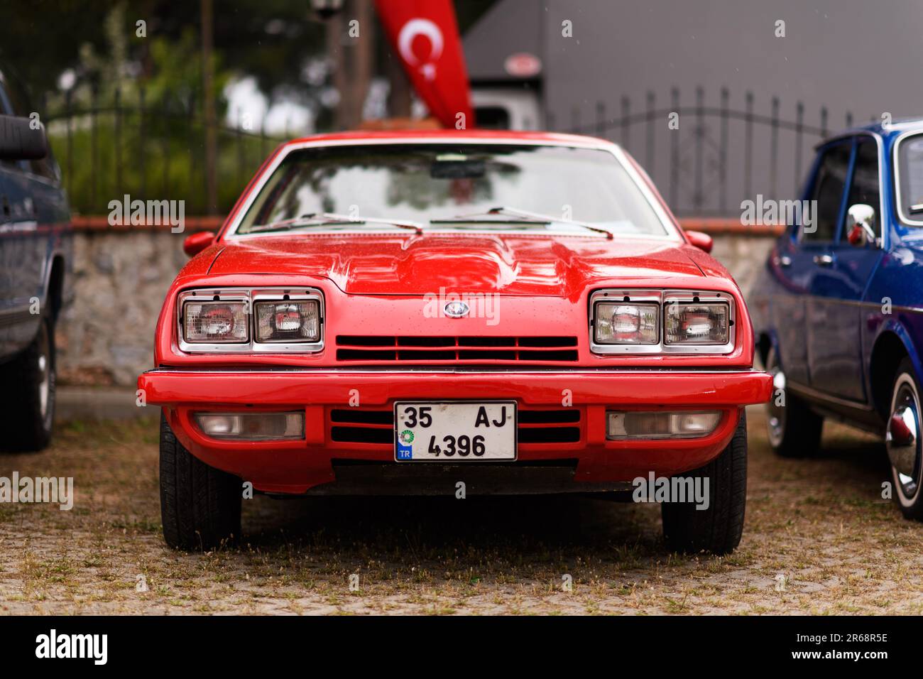 Izmir, Turkey - June 3, 2023: Front view of a red Buick Skyhawk at the IZKOD Classic Car Meet in Buca Pond, Izmir. Stock Photo