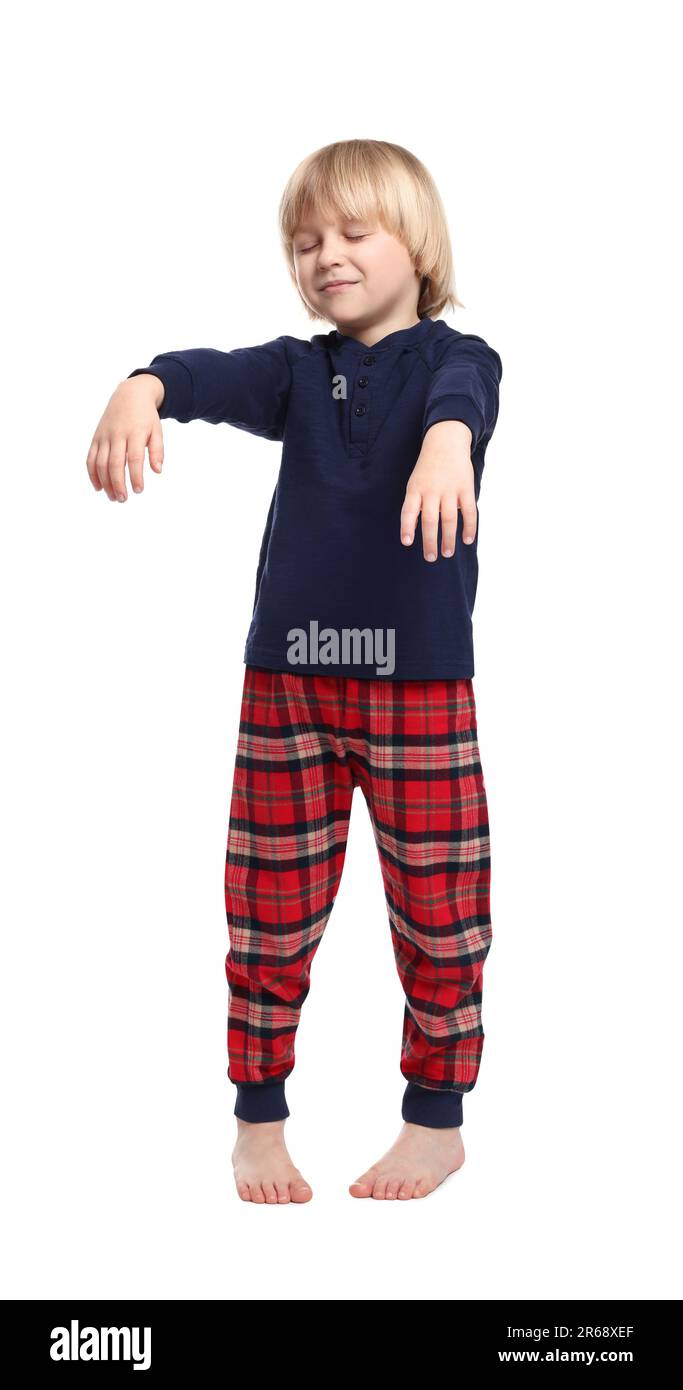 Boy in pajamas sleepwalking on white background Stock Photo Alamy