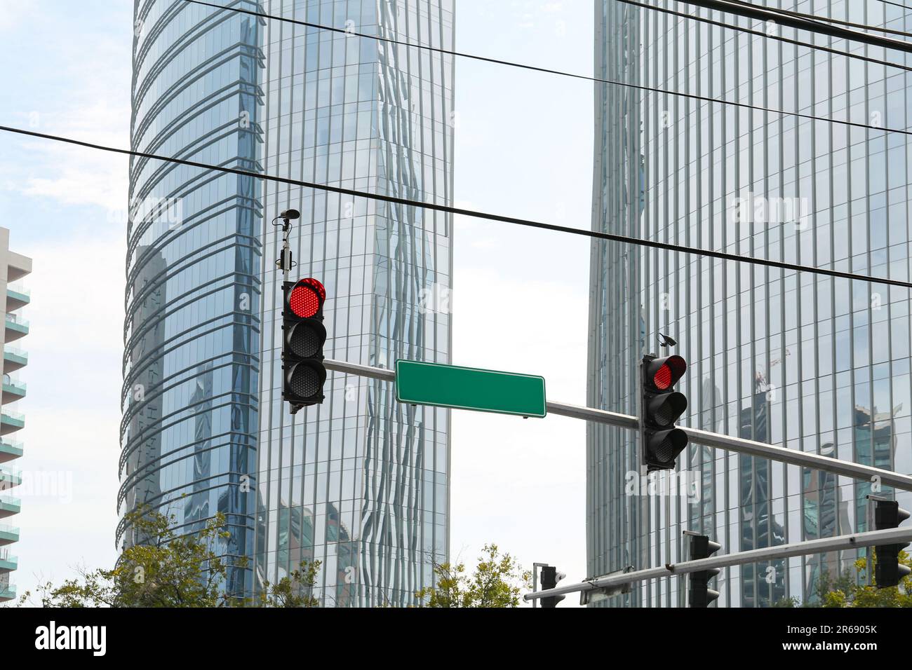 Overhead traffic lights in city. Road rules Stock Photo