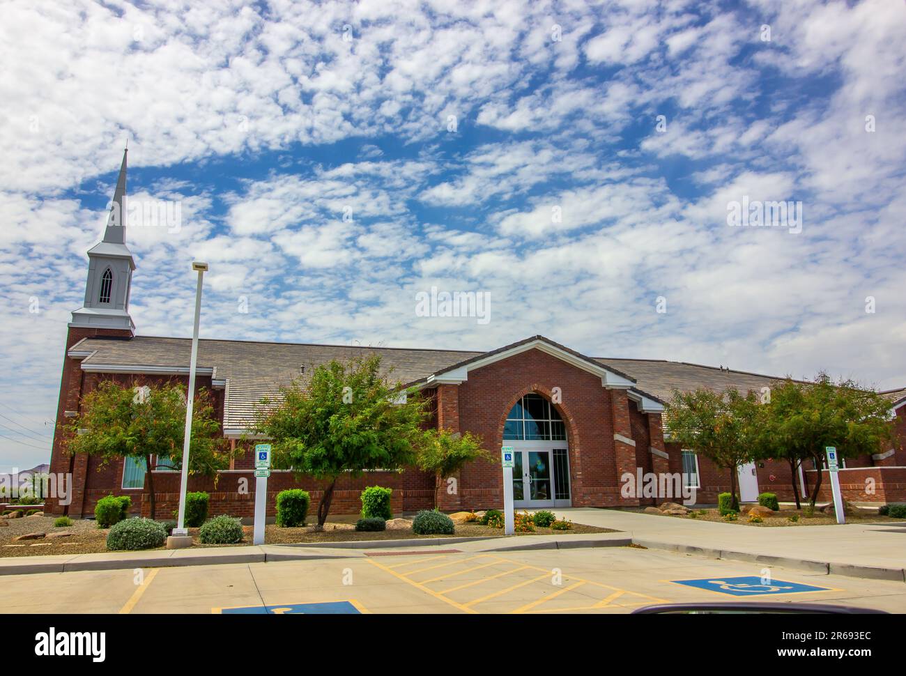 Local Brick Church With White Steeple Stock Photo