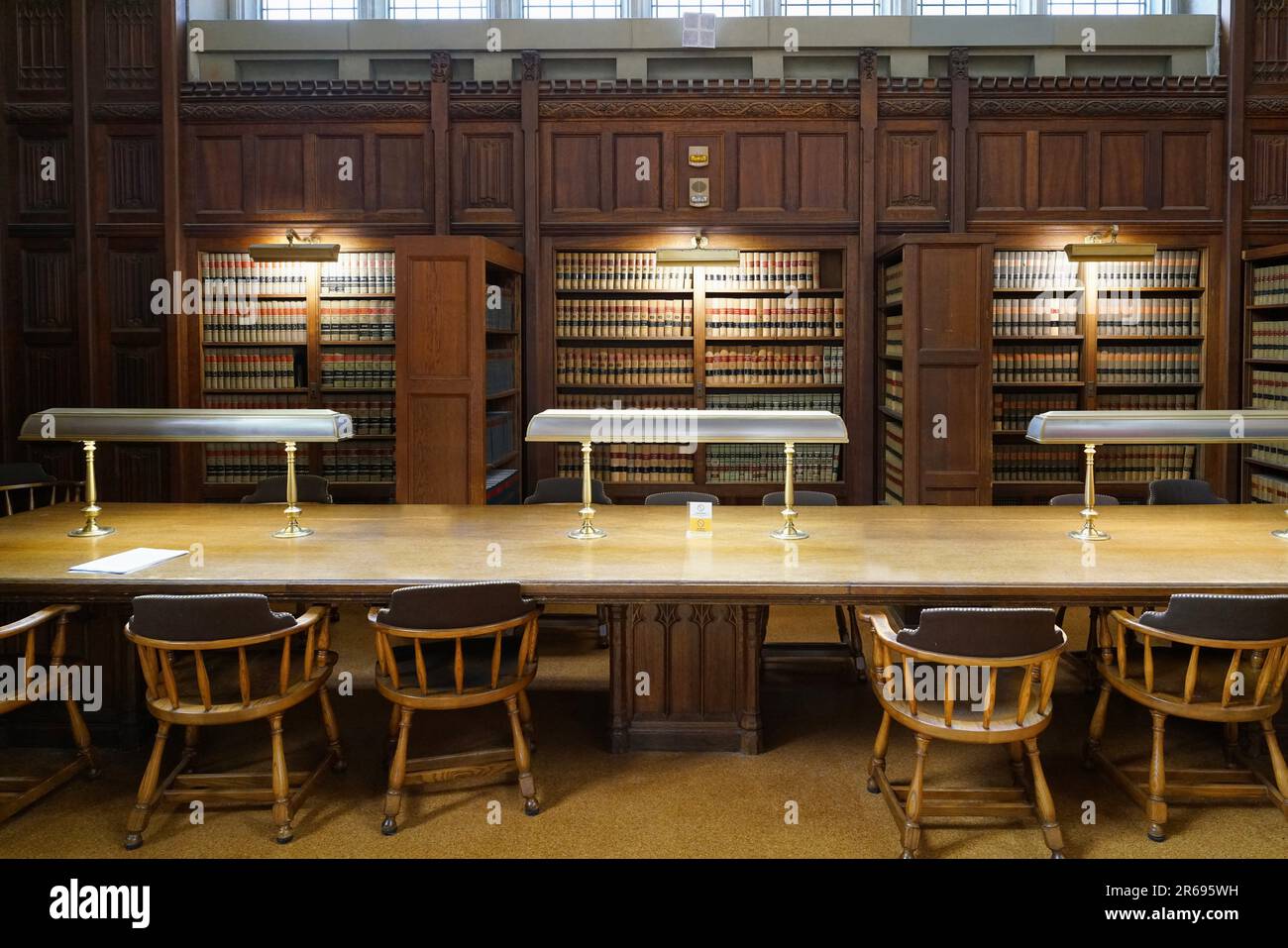 Study table in university library with law books Stock Photo Alamy
