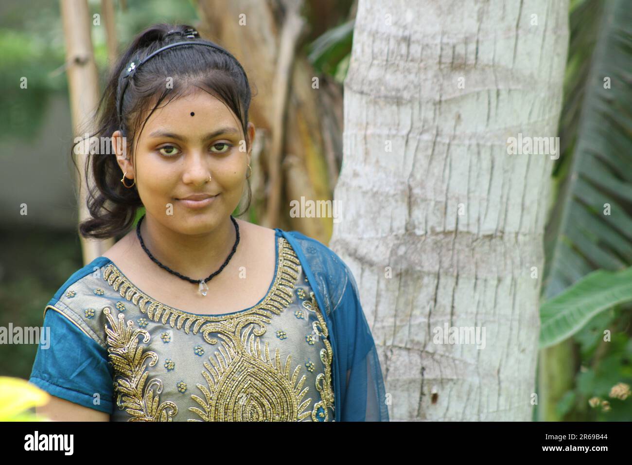 A young beautiful Indian Teenage girl portrait with smiling expression 