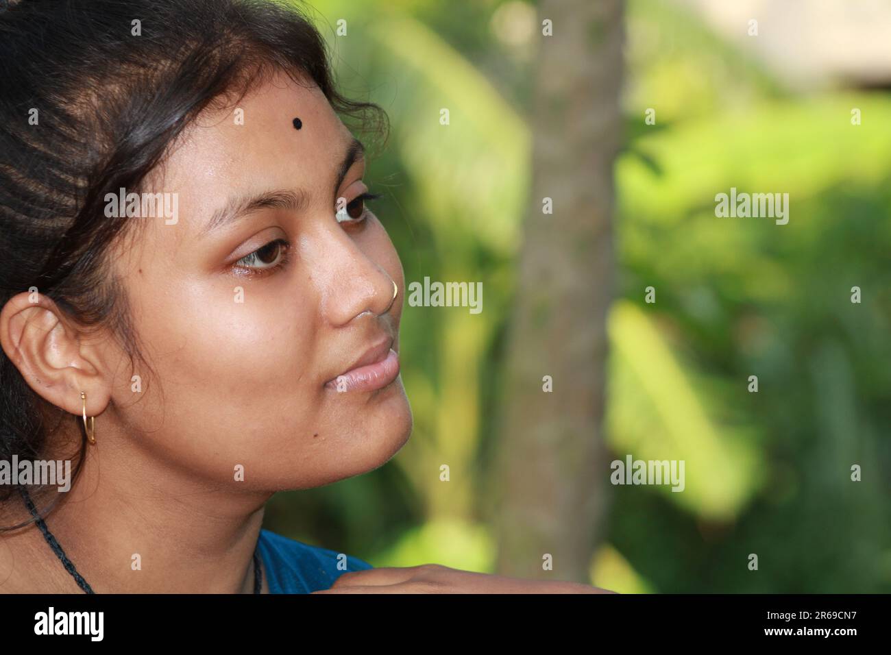 Indian girl happy profile hi-res stock photography and images - Alamy