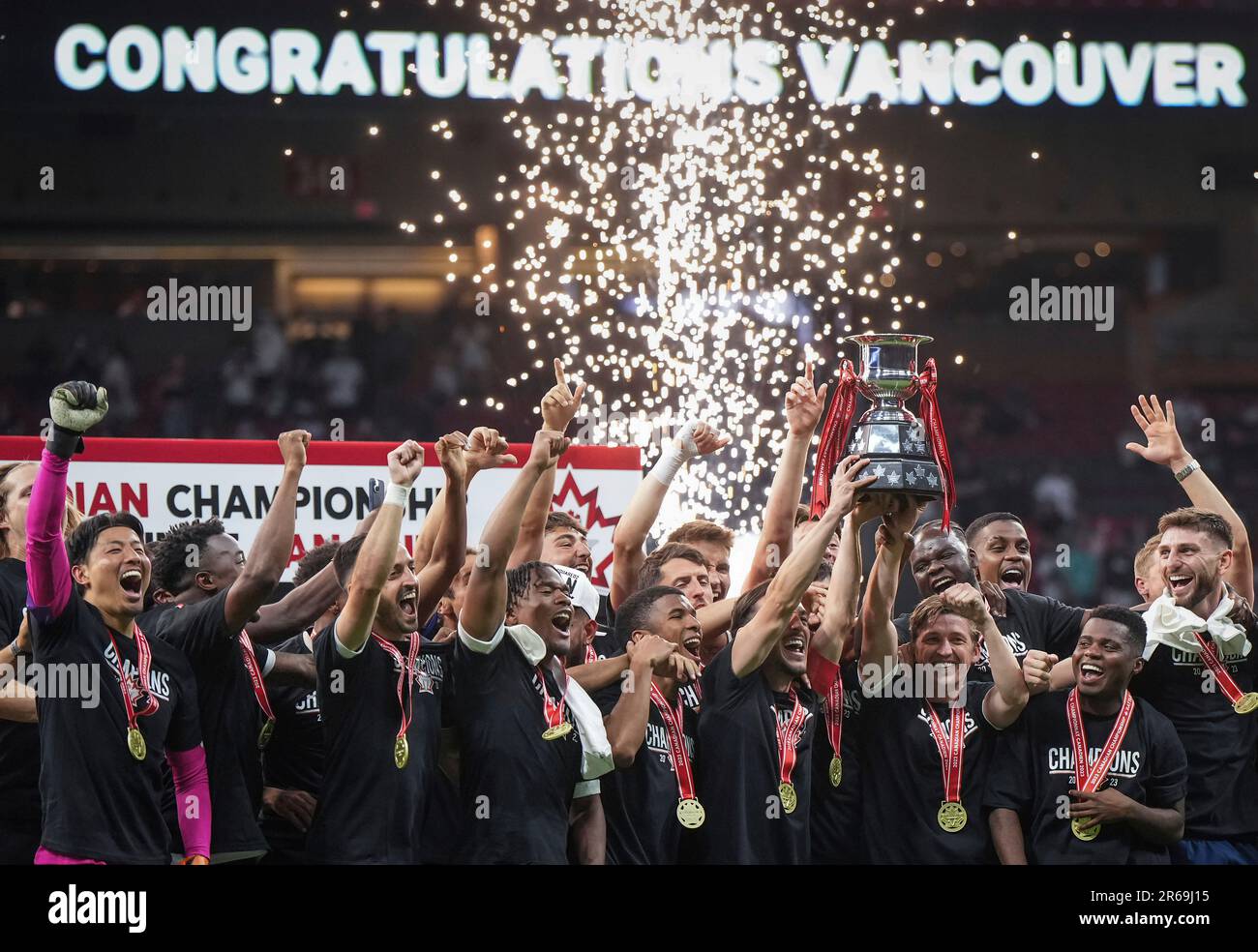 Vancouver Whitecaps' Russell Teibert, front third from right, and Ryan