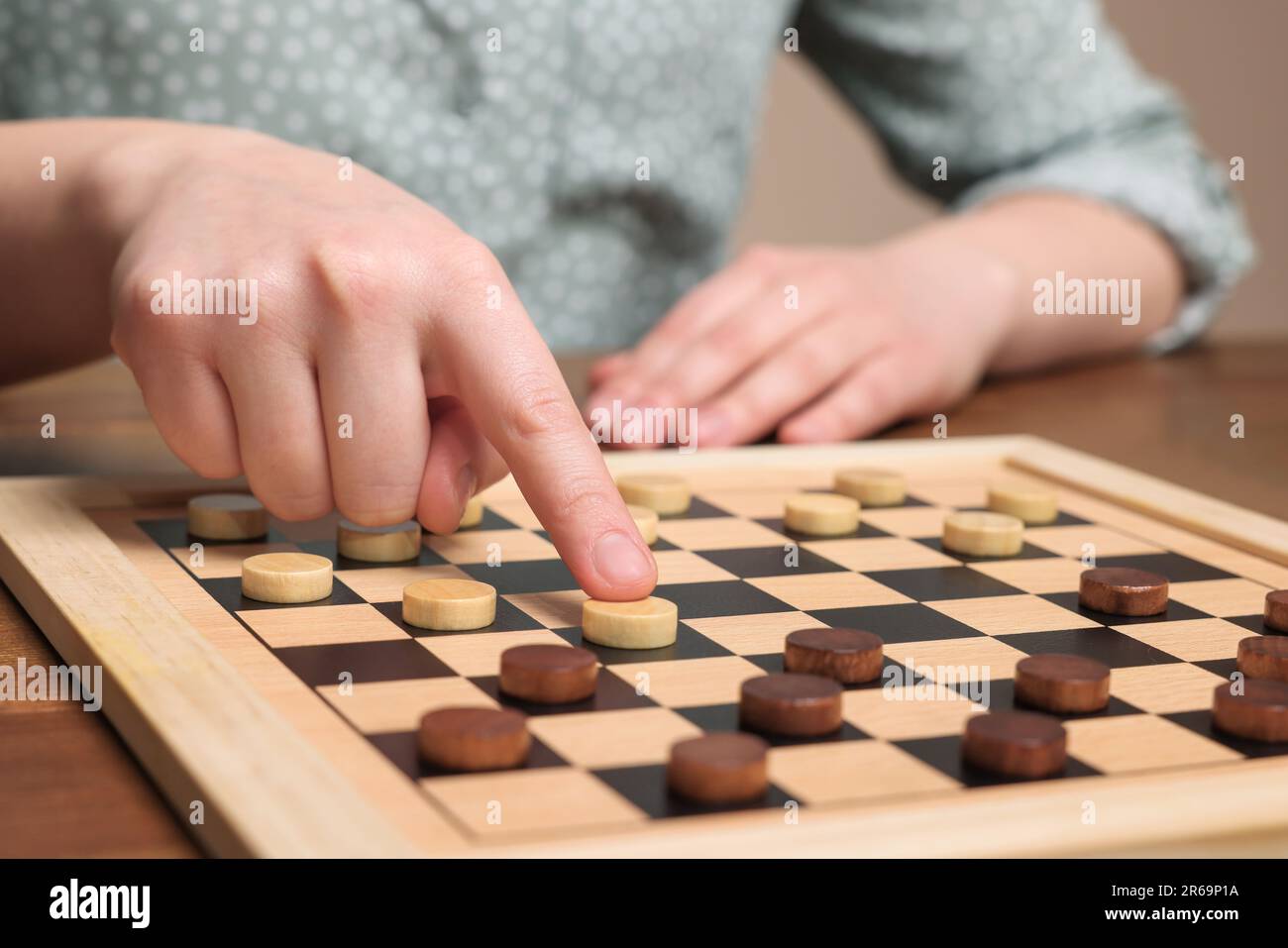 Senior man thinking about his next move in a game of chess Stock Photo by  dmytros9