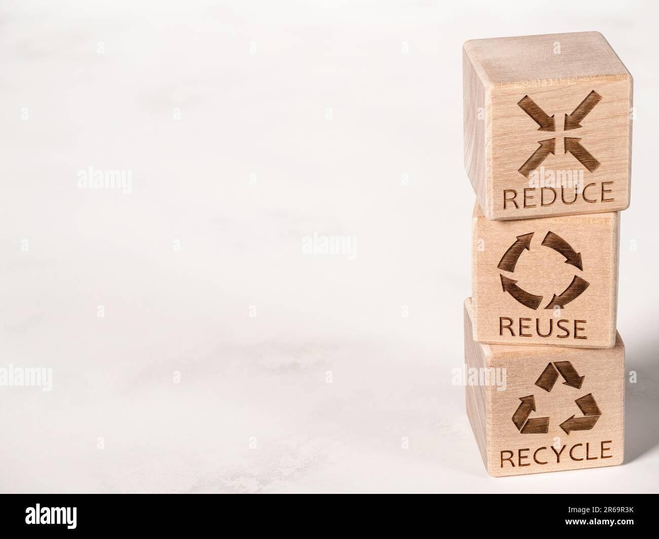 Reduce, Reuse, and Recycle symbols as an environmental conservation concept Stock Photo