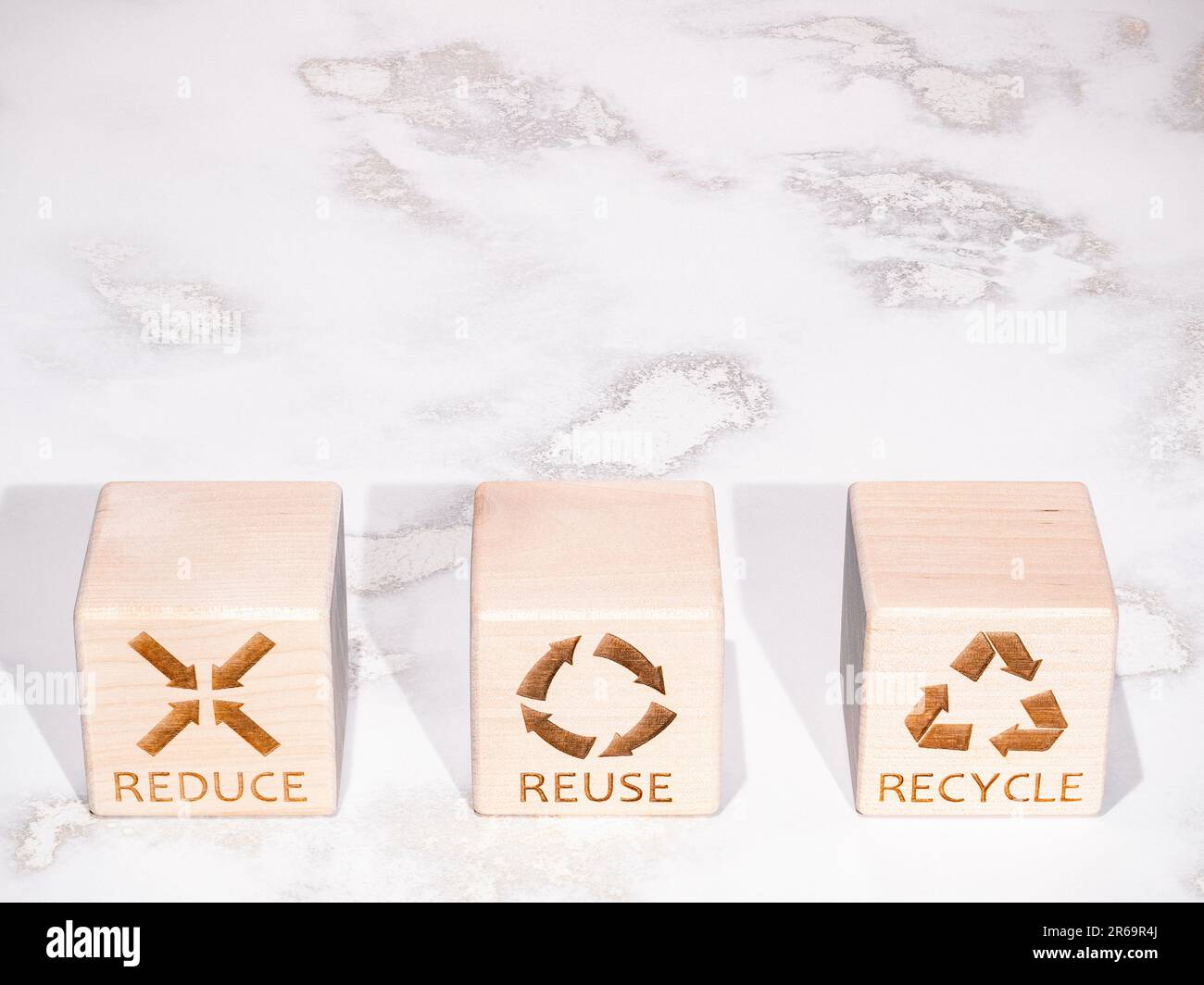 Reduce, Reuse, and Recycle sustainable resources concept symbols Stock Photo