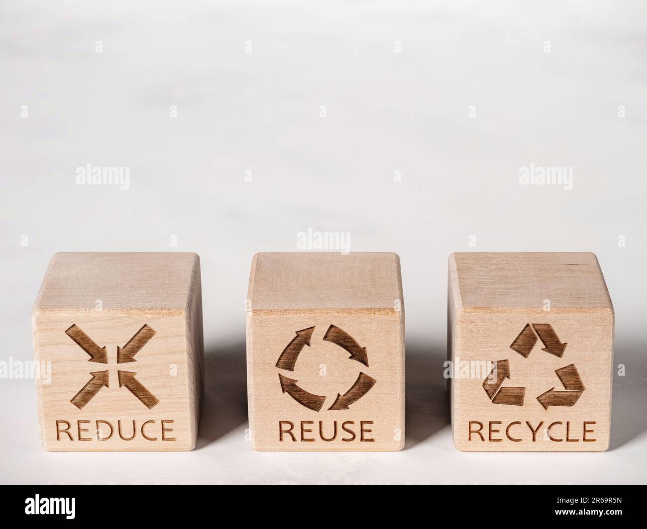 Reduce, Reuse, and Recycle symbols as a resources conservation concept Stock Photo