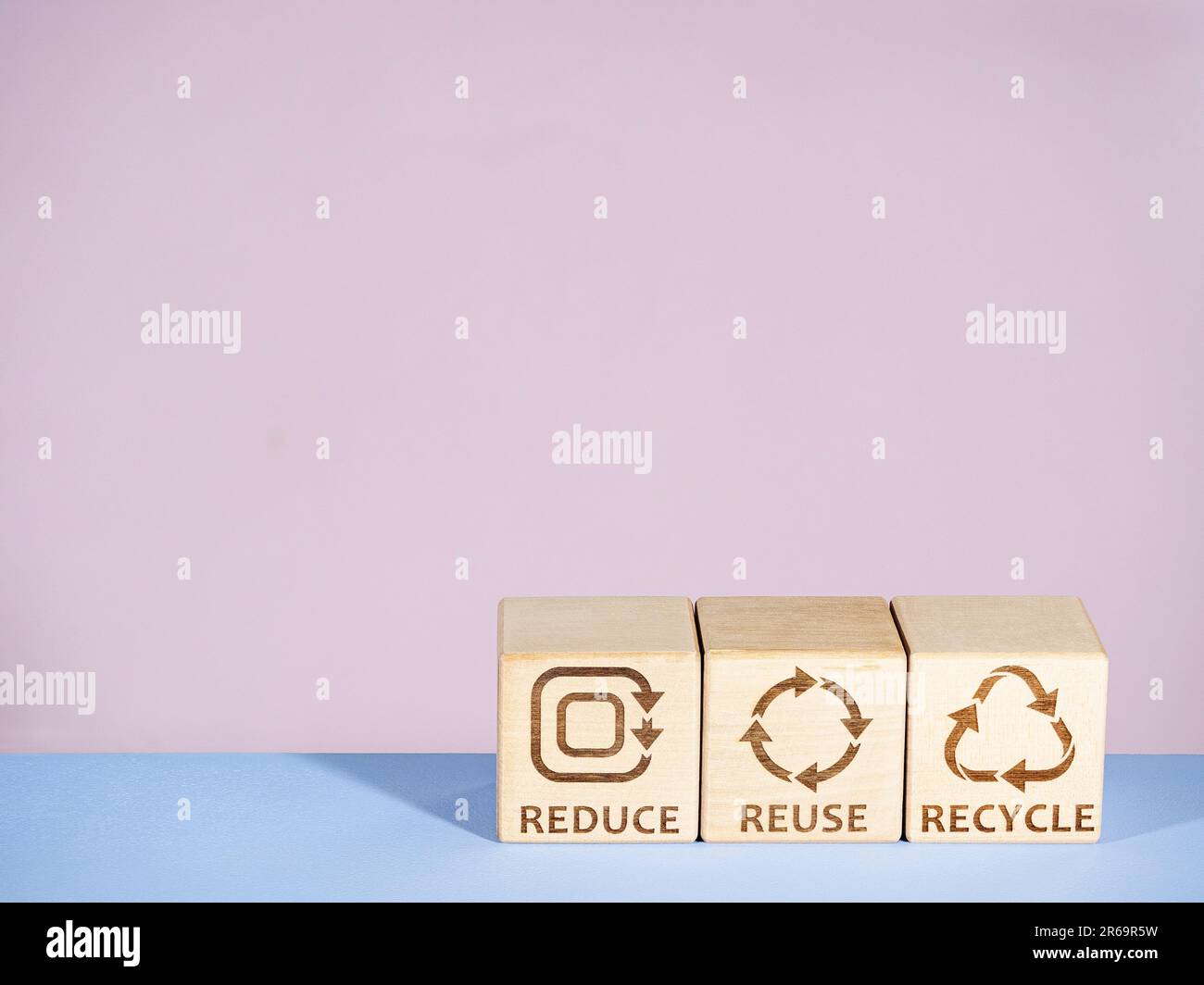 Reduce, Reuse, and Recycle symbols as an environmental conservation business strategy Stock Photo