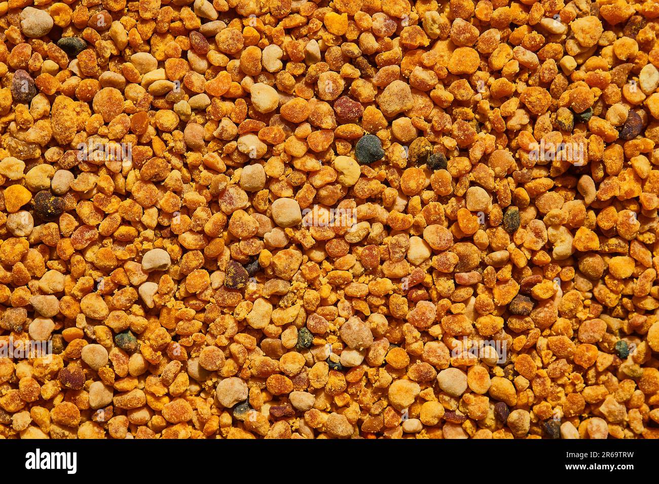 Bee pollen in granules, top view of ecological clean food supplements and health improvement. Useful products, idea for background or advertising Stock Photo