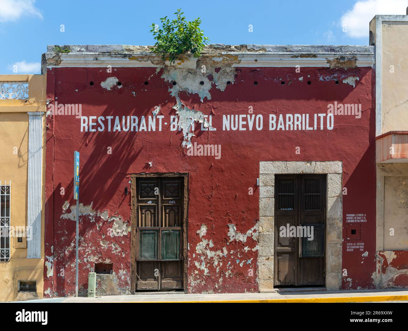 Facade of old historic building, bar restaurant El Nuevo Barralito