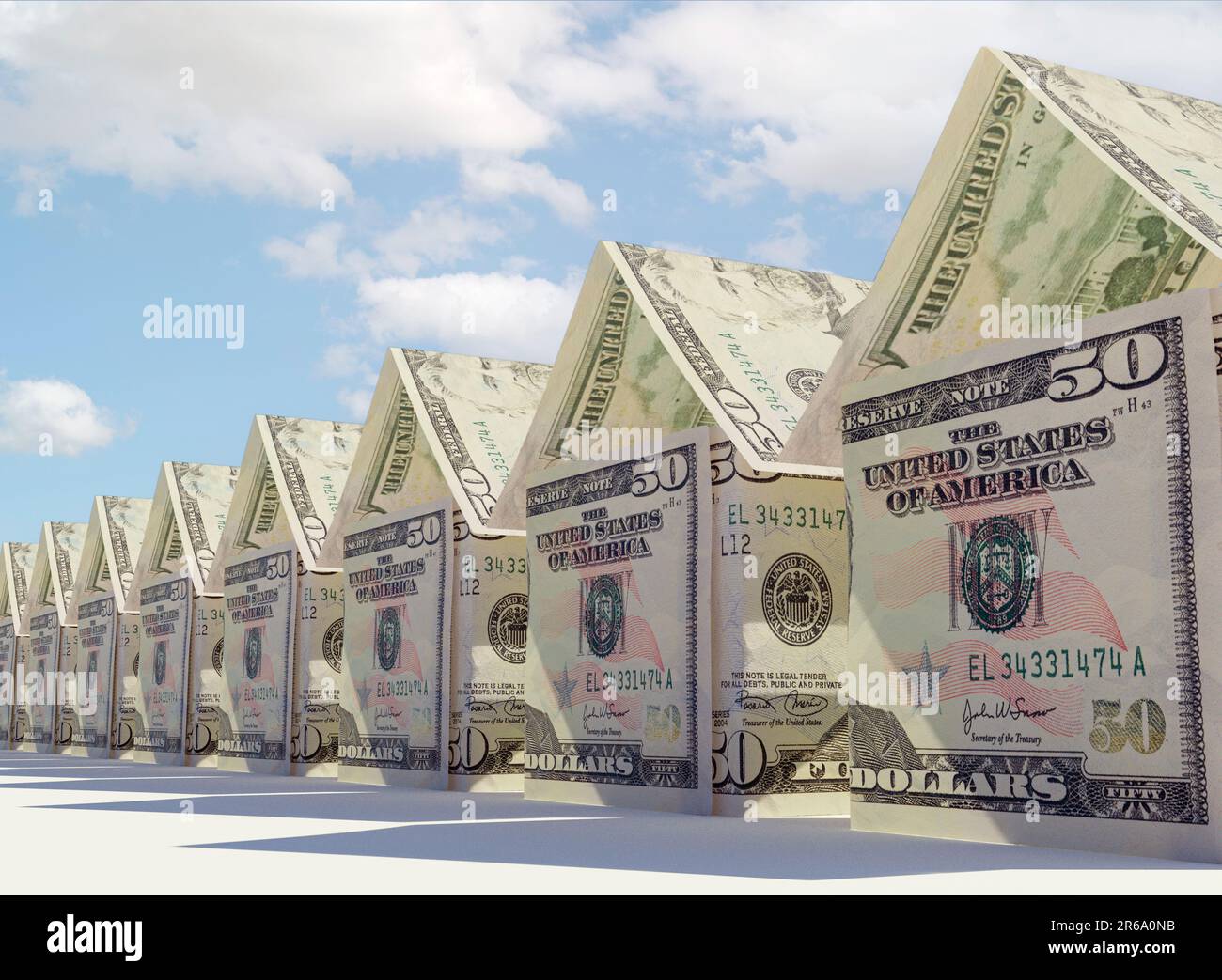 A concept of US dollar bank notes folded into the shape of a mass of