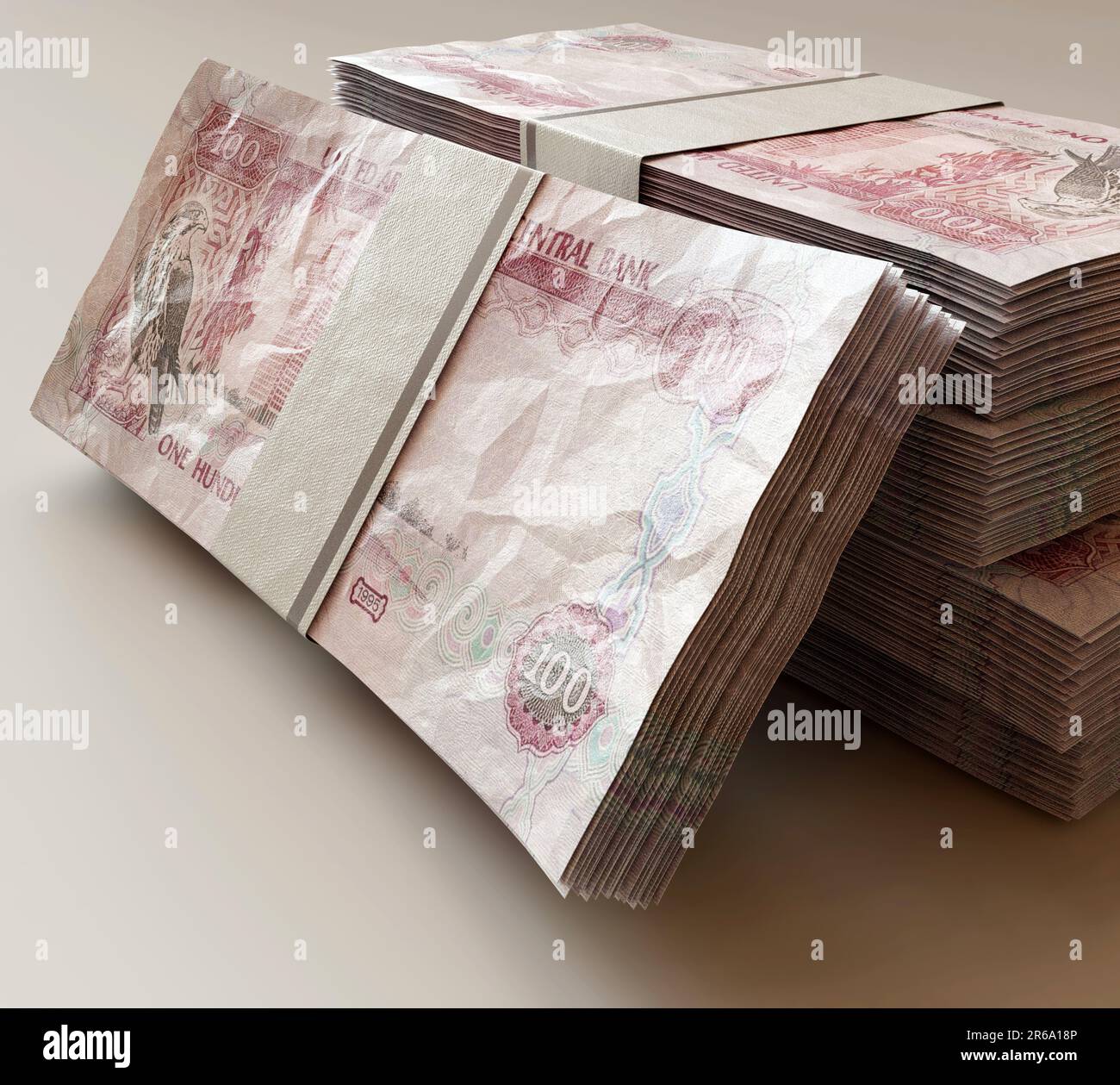 A stack of bundled UAE dirham banknotes on an isolated light background - 3D render Stock Photo