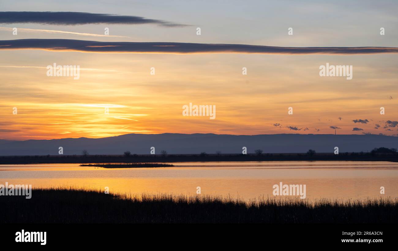 Sunset in the Mexikopuszta, Mexikopuszta, Lake Neusiedl Seewinkel National Park, Fertoe-Hansag Nemzeti Park, Fertoe-Hansag, Hungary Stock Photo