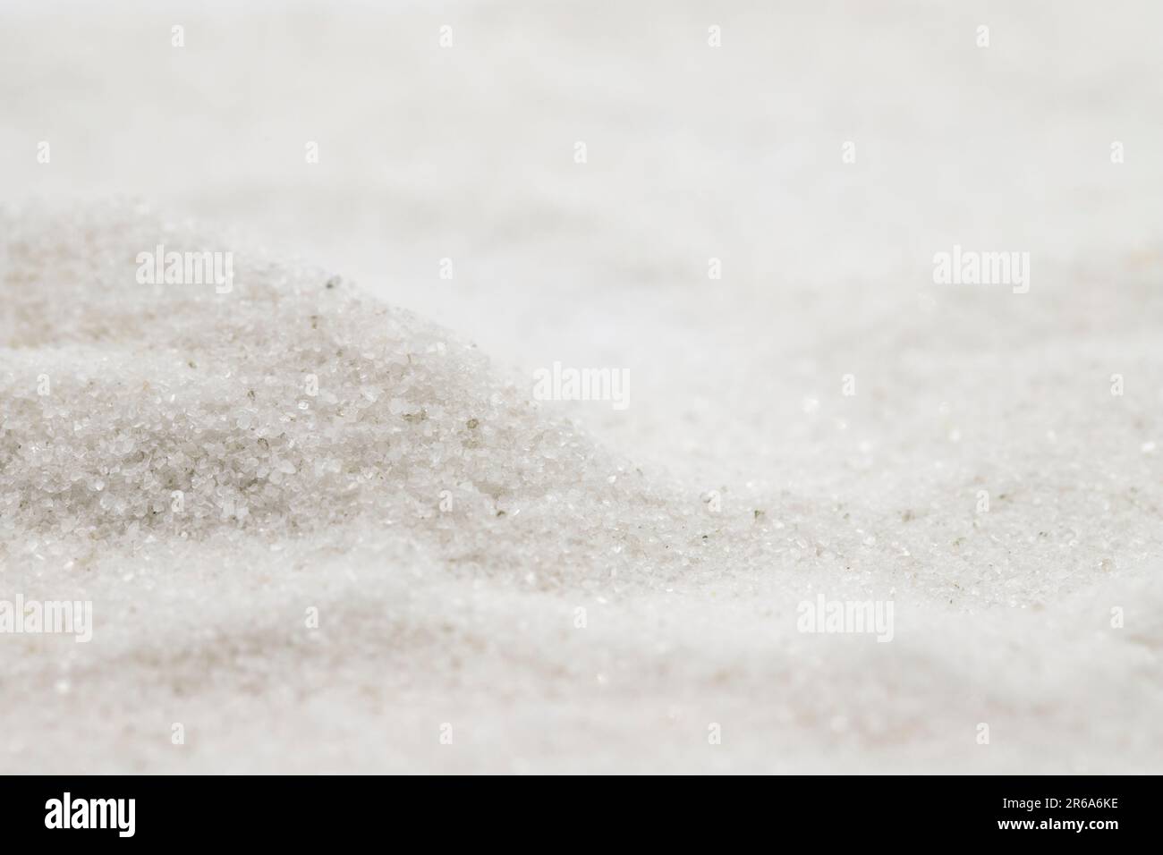 Natural minaret crystalline noniodized grinding salt isolated on white