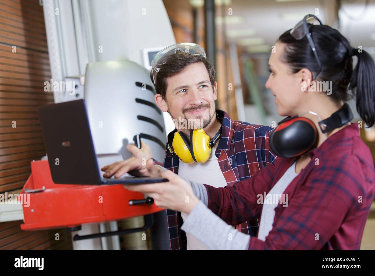 wood industry technicians working together on project Stock Photo