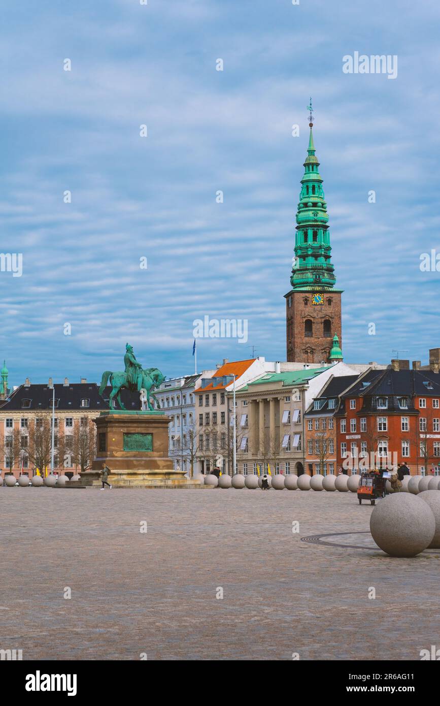 clock tower behind buildings Stock Photo - Alamy