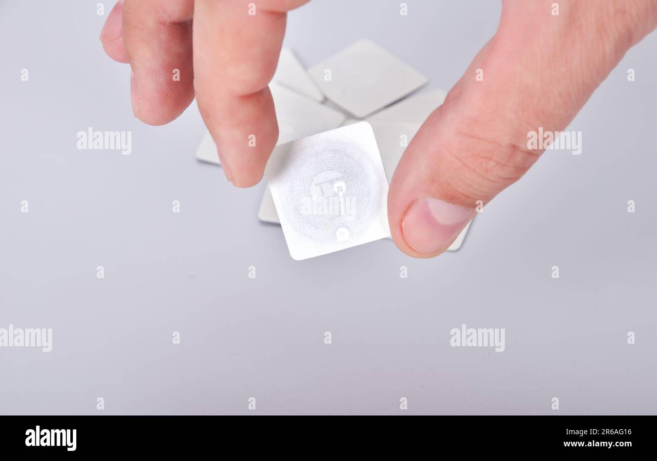 hand holding rfid tags, close up Stock Photo