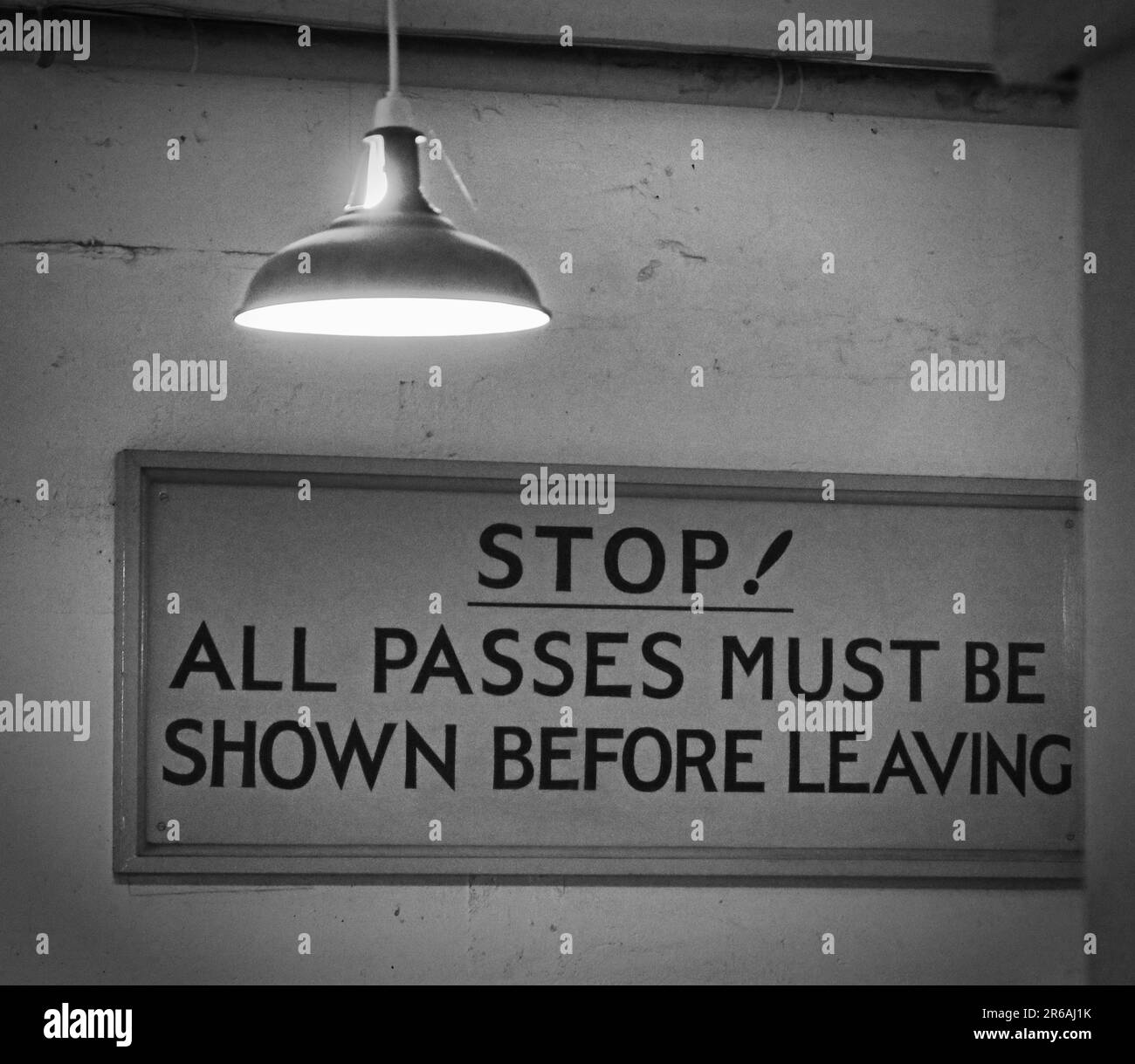 Security and keeping things secure - Stop - All passes must be shown, before leaving ! Stock Photo
