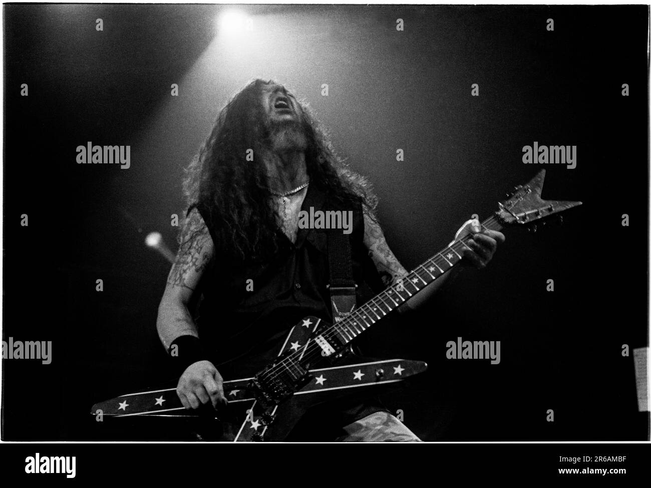 DIMEBAG DARRELL, PANTERA, 2000: Dimebag Darrell (1966-2004) guitarist with Pantera playing live on one of the last tours with the band's classic lineup at Newport Centre in Newport, Wales, UK on 24 April 2000. Photograph: Rob Watkins.  INFO: Dimebag Darrell, born Darrell Lance Abbott on August 20, 1966, in Arlington, Texas, was a revered guitarist known for his groundbreaking work with Pantera. Tragically, he was fatally shot onstage in 2004, leaving behind a legacy of influential metal music and devoted fans. Stock Photo