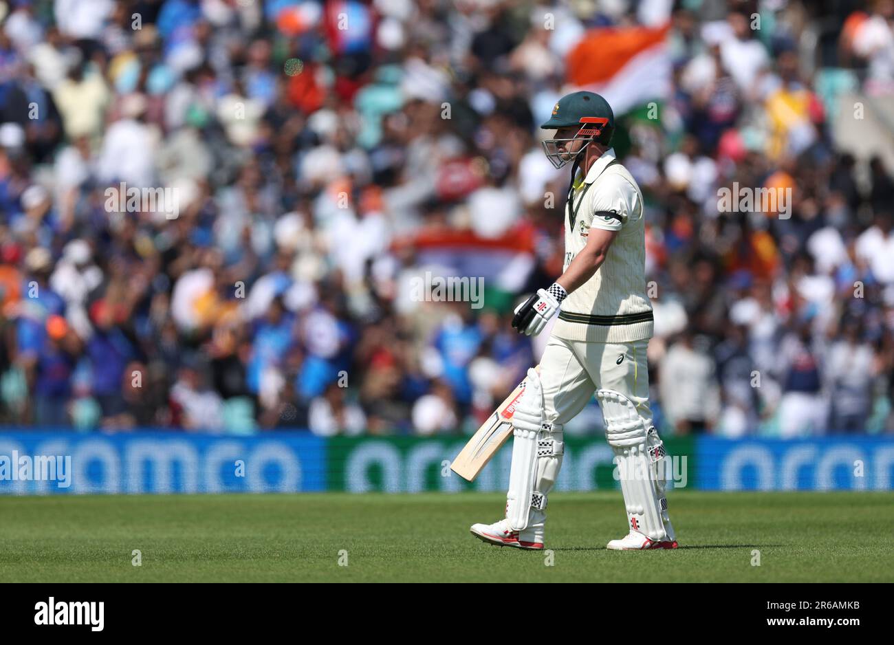 Australia's Travis Head leaves the field after being dismissed for 163