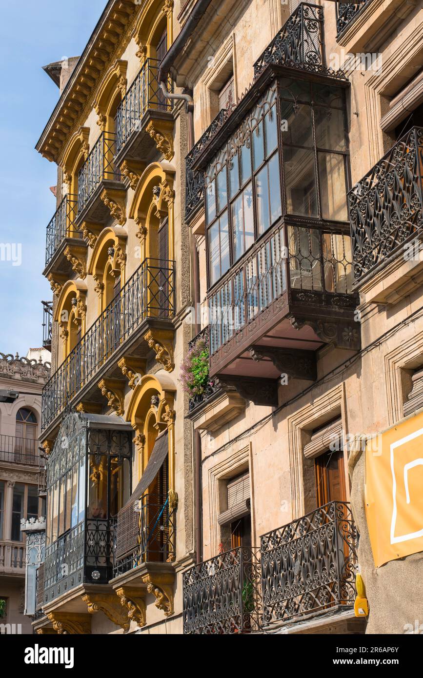 Spain street, view of a street in Salamanca containing apartments with jettied balconies enclosed with glass typical of central and northern Spain. Stock Photo