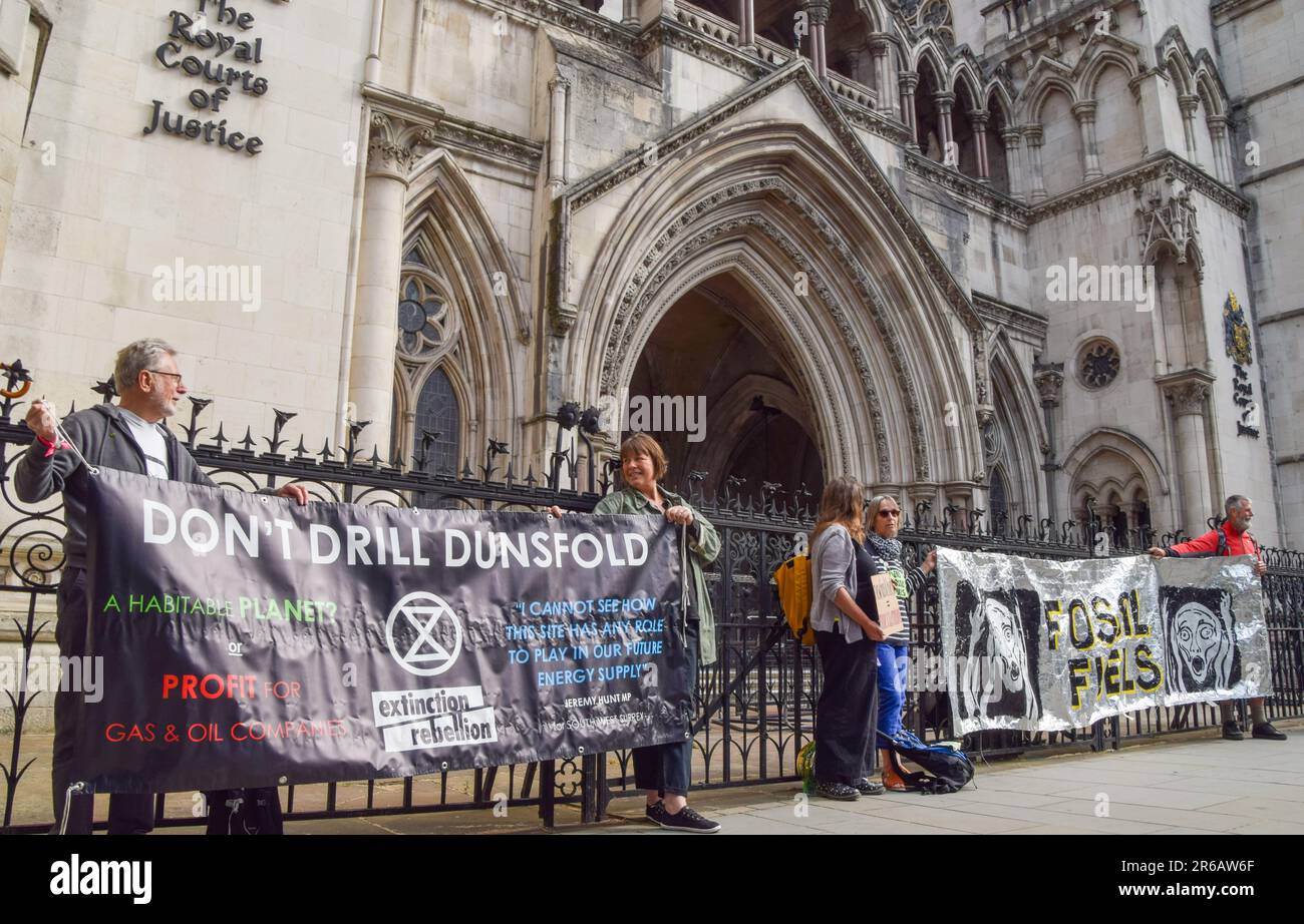 London, England, UK. 8th June, 2023. Climate protesters gathered outside the Royal Courts of Justice during the judicial review of the planning permission for UK Oil & Gas to explore for fossil fuels near the village of Dunsfold. (Credit Image: © Vuk Valcic/ZUMA Press Wire) EDITORIAL USAGE ONLY! Not for Commercial USAGE! Stock Photo