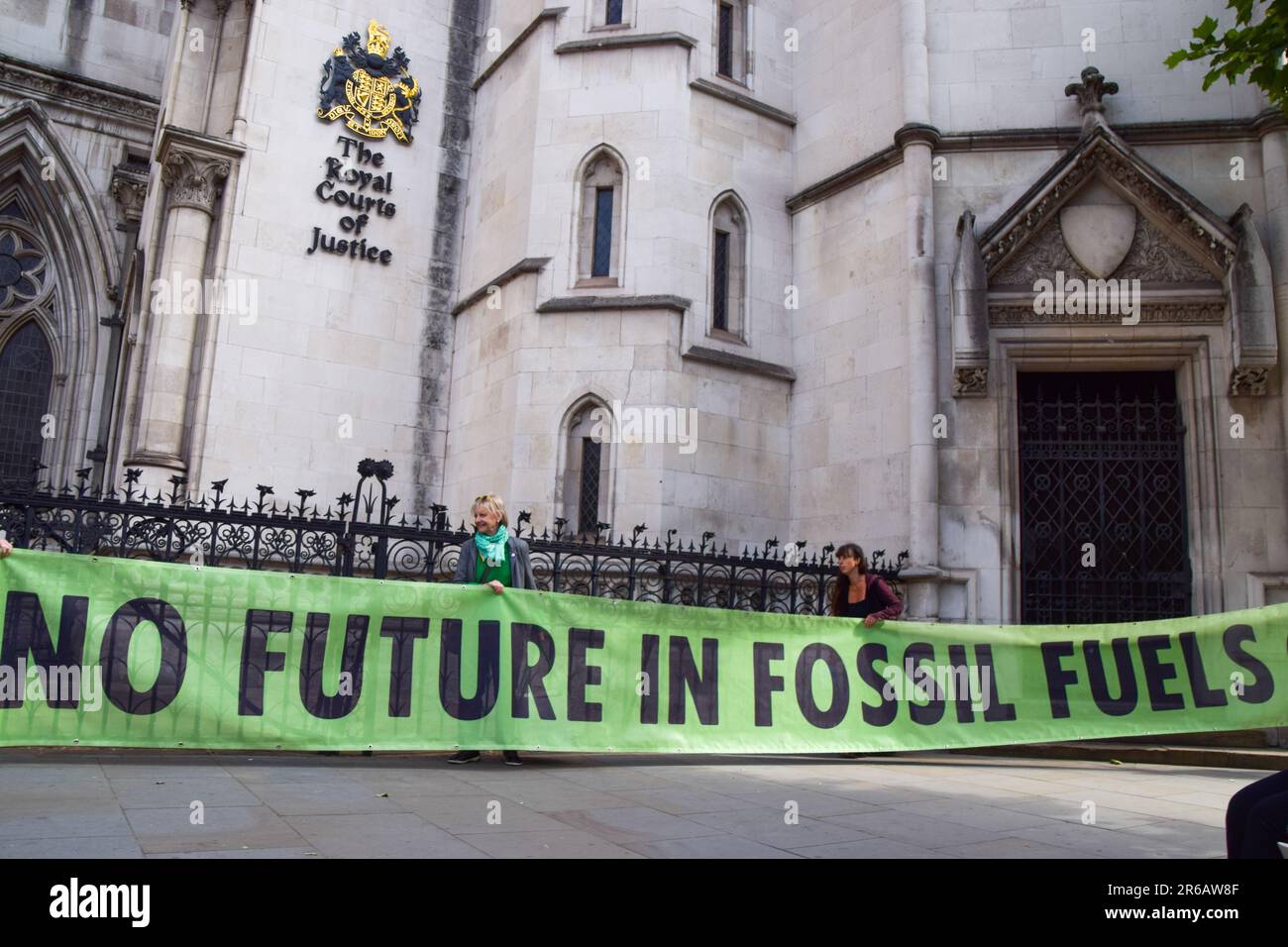 London, England, UK. 8th June, 2023. Climate protesters gathered outside the Royal Courts of Justice during the judicial review of the planning permission for UK Oil & Gas to explore for fossil fuels near the village of Dunsfold. (Credit Image: © Vuk Valcic/ZUMA Press Wire) EDITORIAL USAGE ONLY! Not for Commercial USAGE! Stock Photo