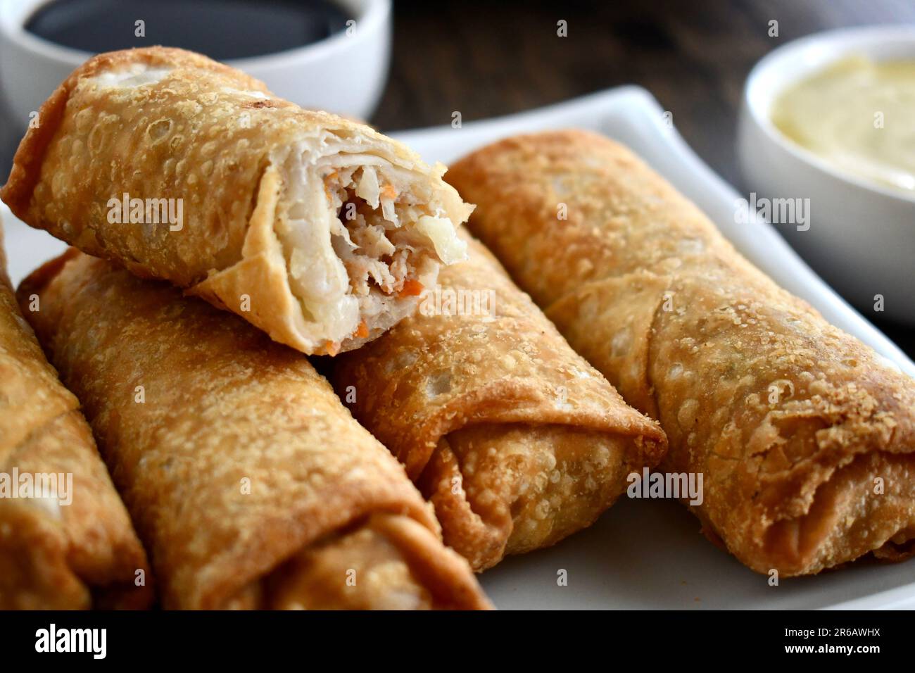 Egg rolls on a white plate Stock Photo