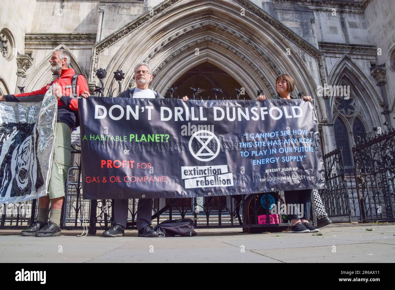 London, UK. 8th June 2023. Climate protesters gathered outside the Royal Courts of Justice during the judicial review of the planning permission for UK Oil & Gas to explore for fossil fuels near the village of Dunsfold. Credit: Vuk Valcic/Alamy Live News Stock Photo