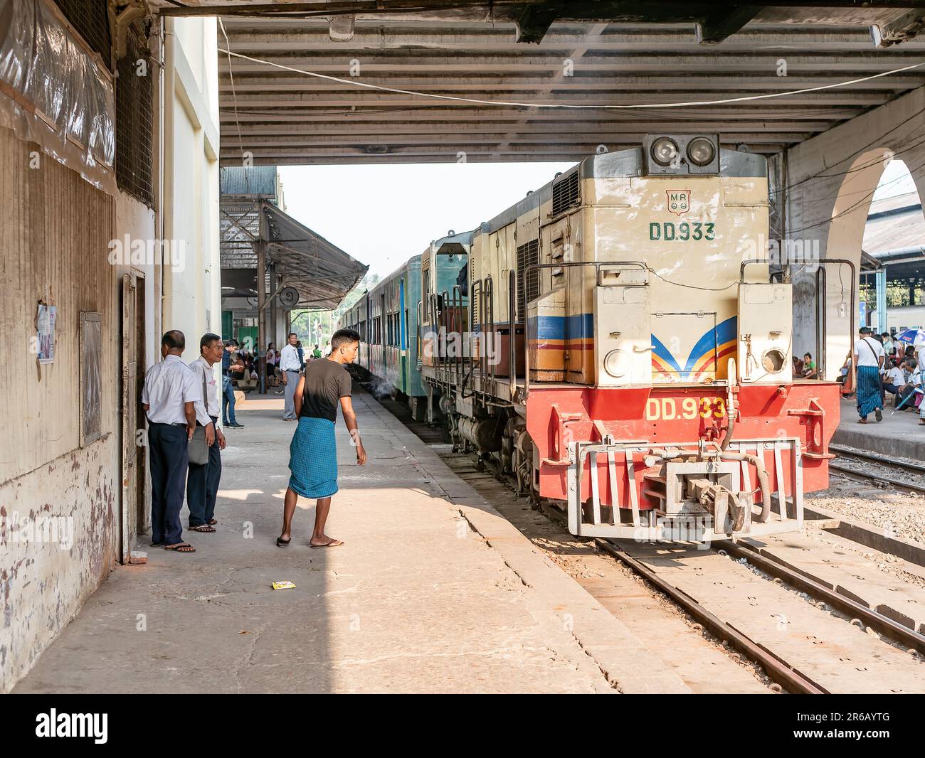 Passenger train with old diesel engine at Yangon Central, the main railway station in Yangon, Myanmar. Stock Photo