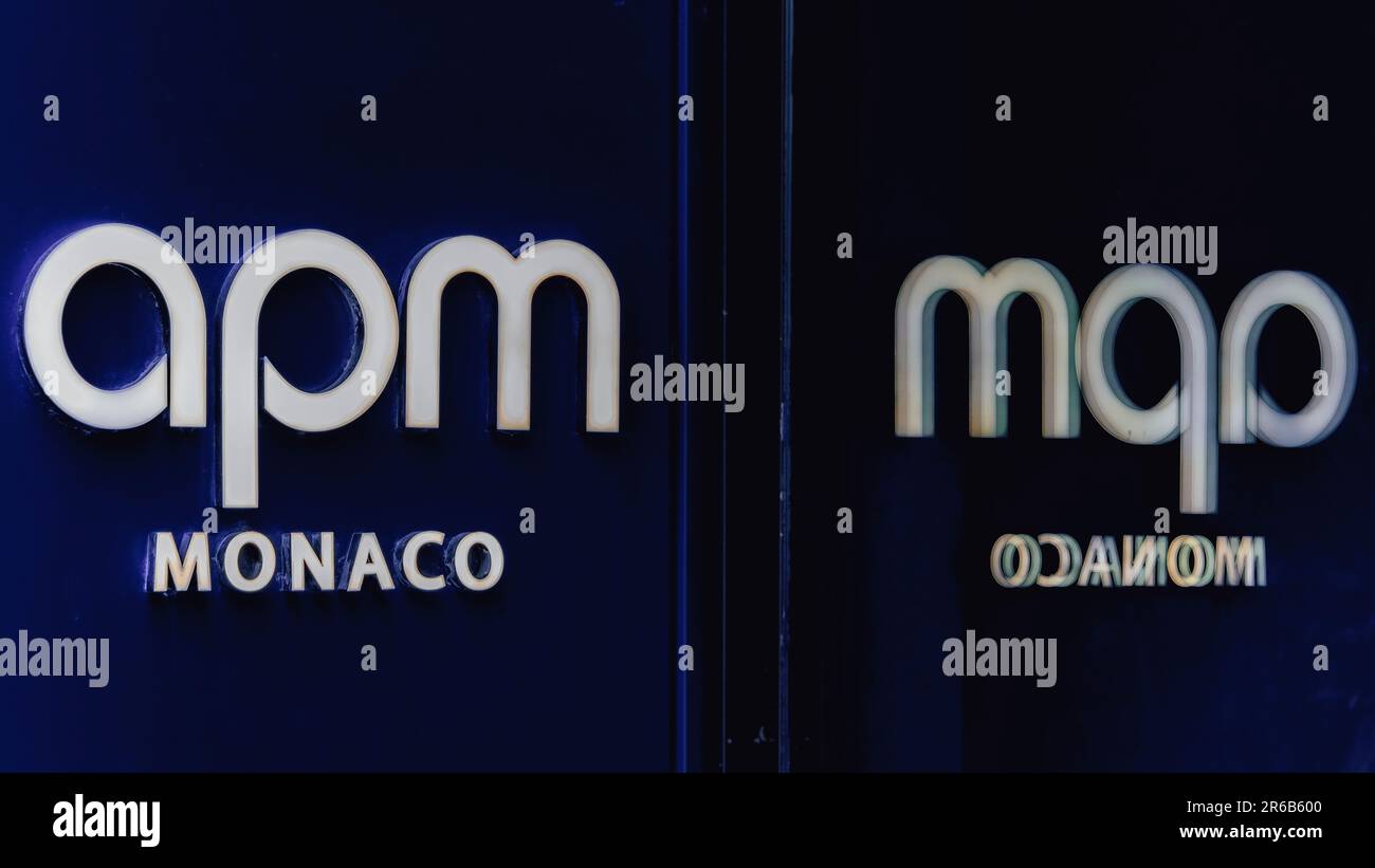 Toronto, Canada - June 4, 2023: The APM Monaco sign on a dark background. A  reflection of the sign stands next to it Stock Photo - Alamy