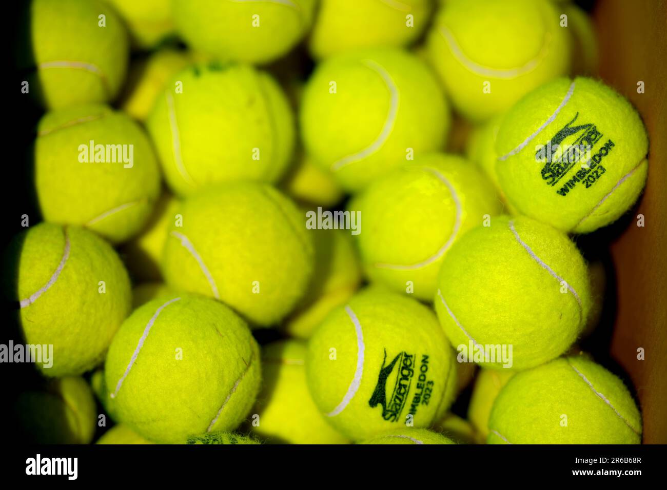 A general view of Slazenger Wimbledon 2023 branded tennis balls during day four of the 2023 Lexus Surbiton Trophy at Surbiton Racket and Fitness Club, London. Picture date: Thursday June 8, 2023. Stock Photo