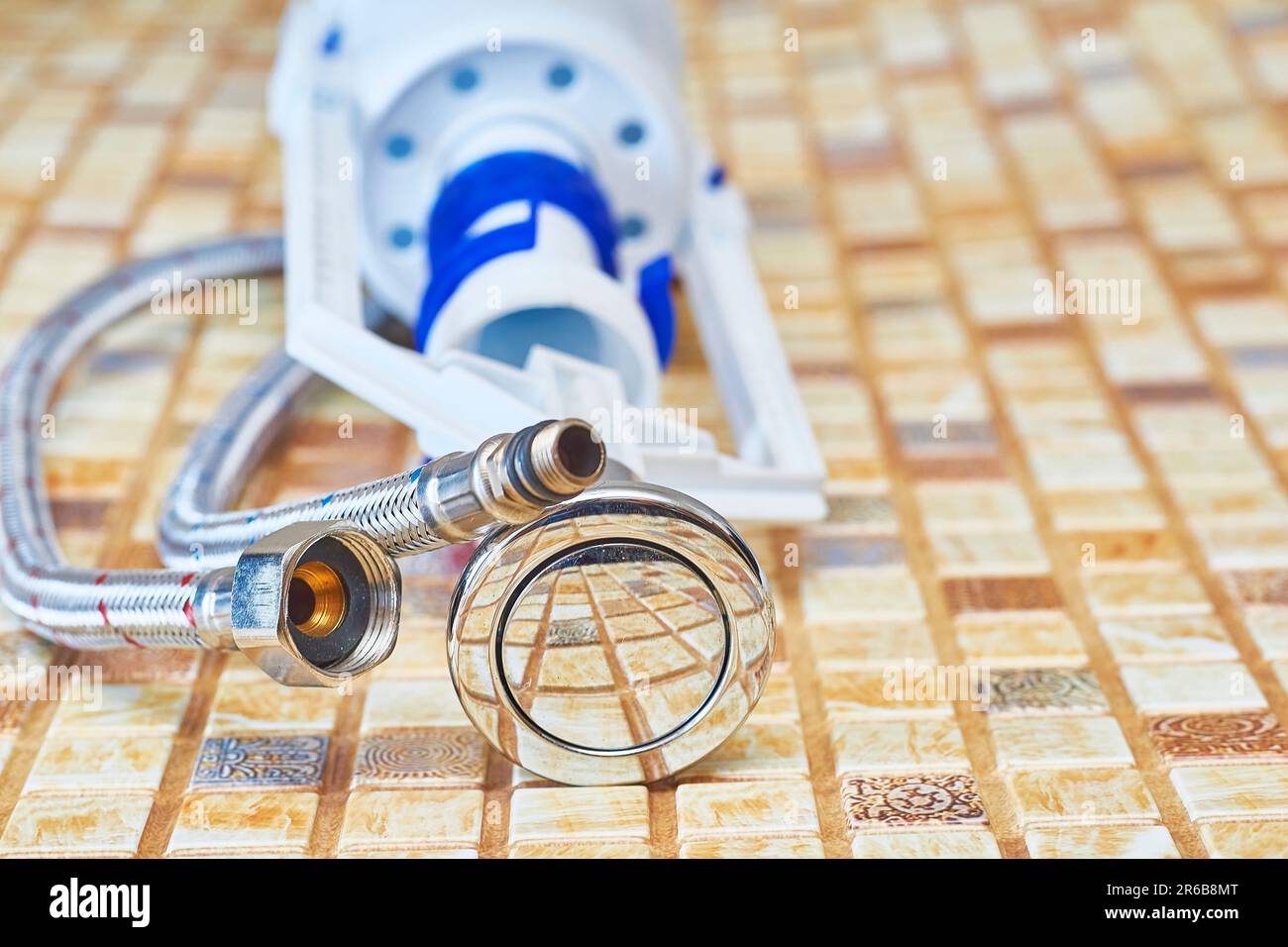 Plumbing. Flexible metal steel faucet hoses, flush mechanism, siphon