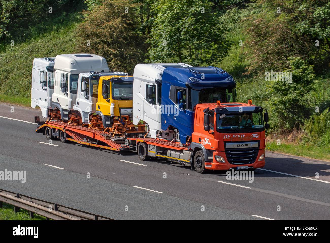 DAF XG, CF, and XF Vehicle truck cabs being transported to Leyland for assembly into HGV Trucks. Cab and axle assemblies are produced at the Westerlo plant in Belgium, EU. Stock Photo