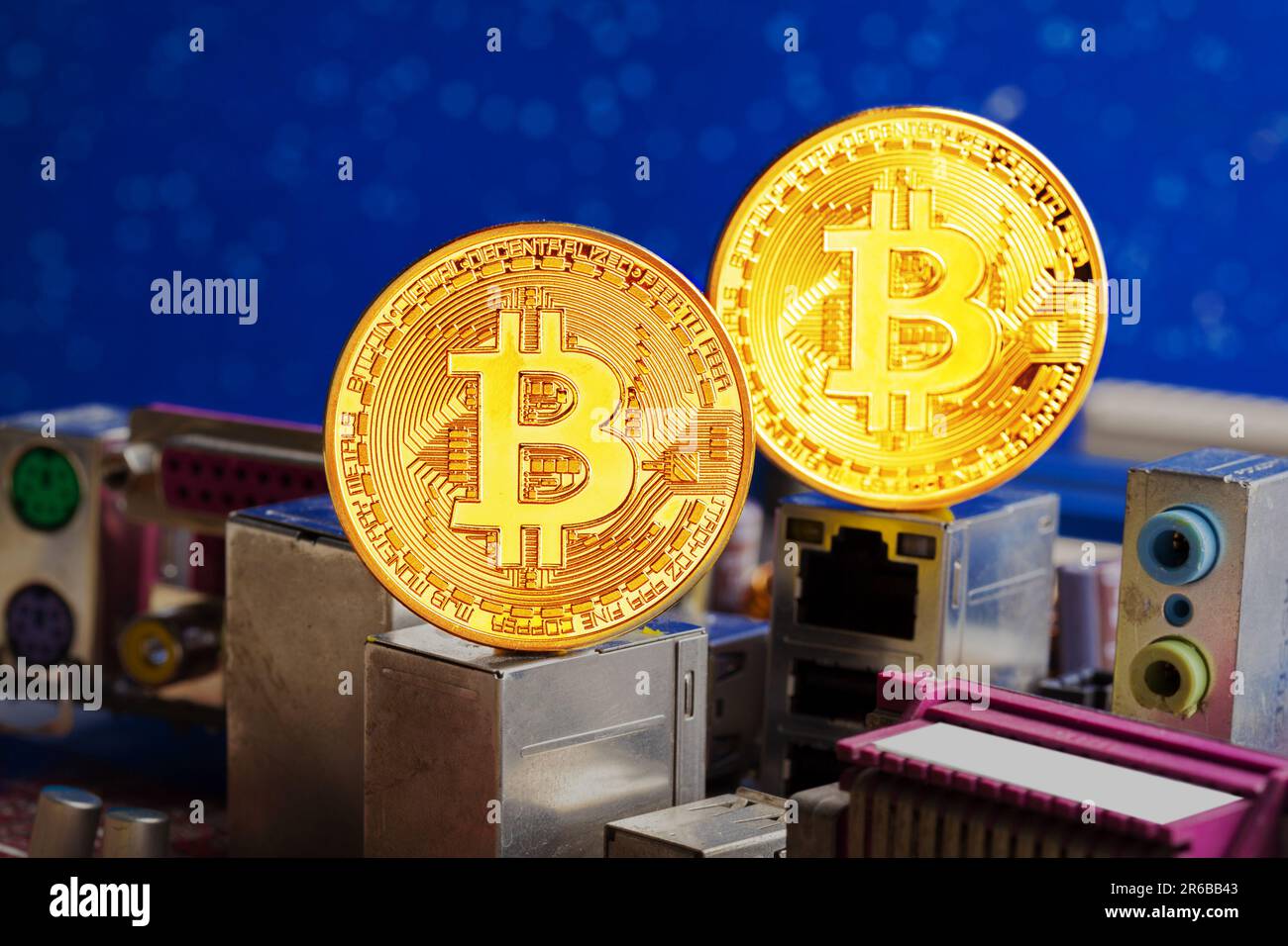 Bitcoin Computer Size Bitcoin and a computer graphic card Stock Photo - Alamy
