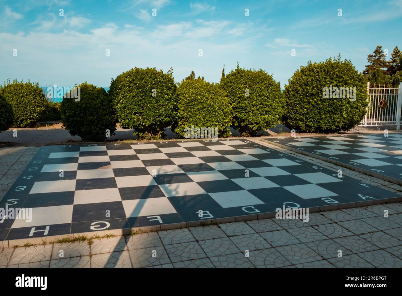 Huge chess figures on floor outdoor Stock Photo