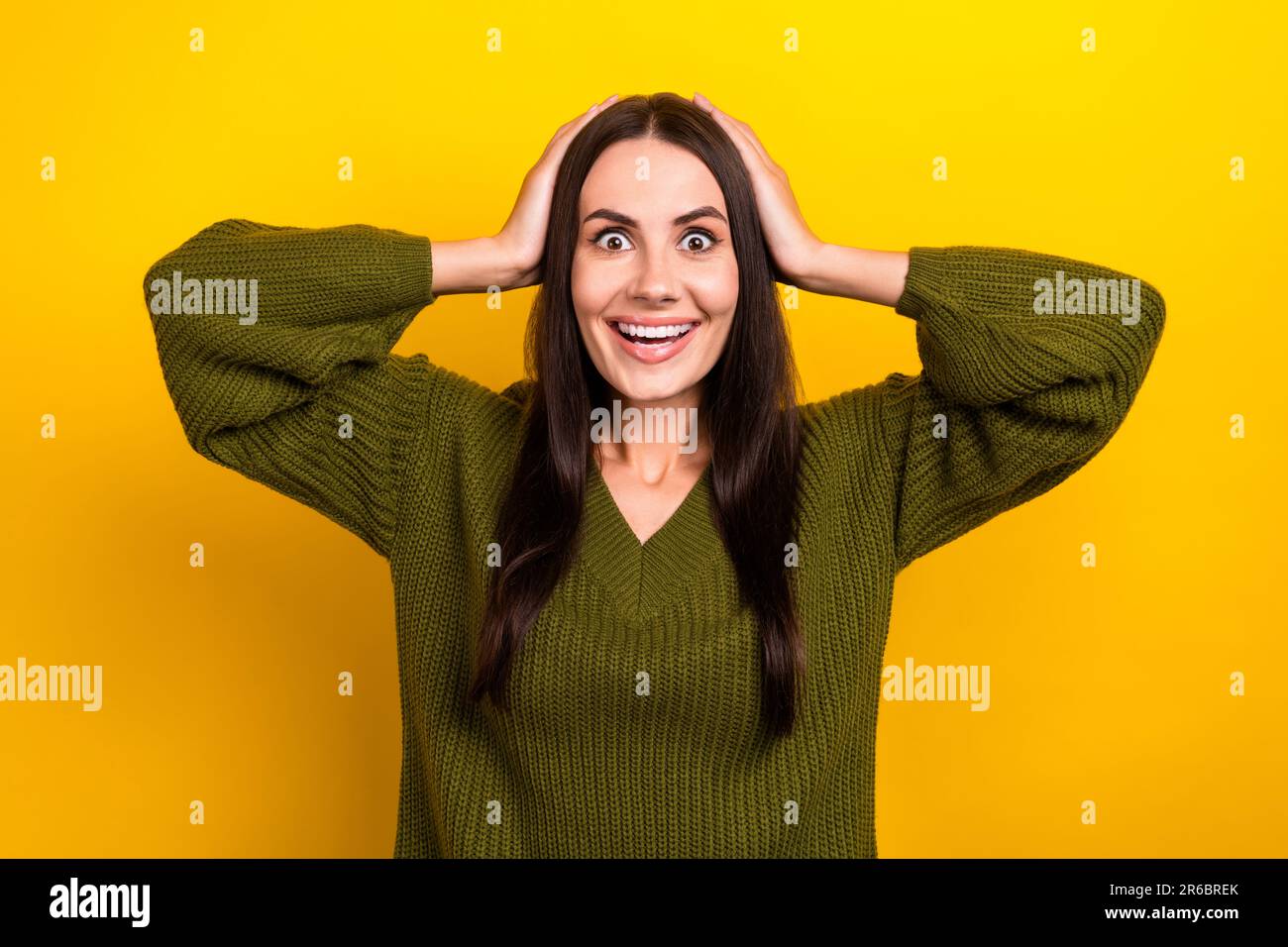 Photo of astonished cheerful person arms touch head beaming smile ...