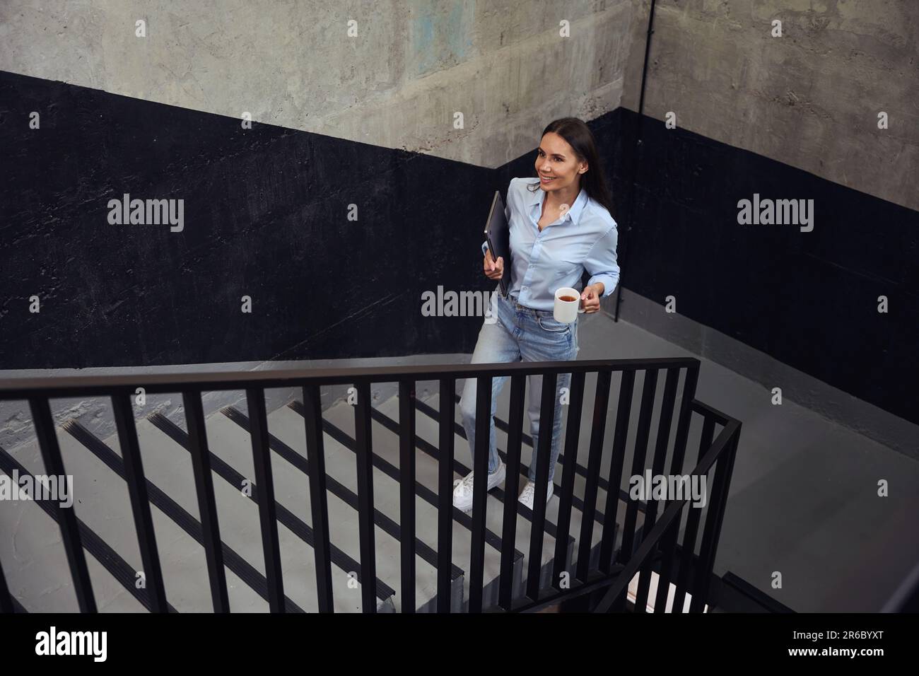 Stairs woman walking up office hi-res stock photography and images - Alamy