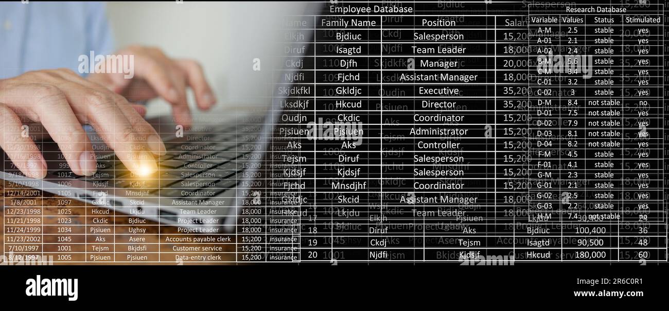 Data entry concept. A man is entering information or updating records in a database or computer system, or spreadsheet. Stock Photo