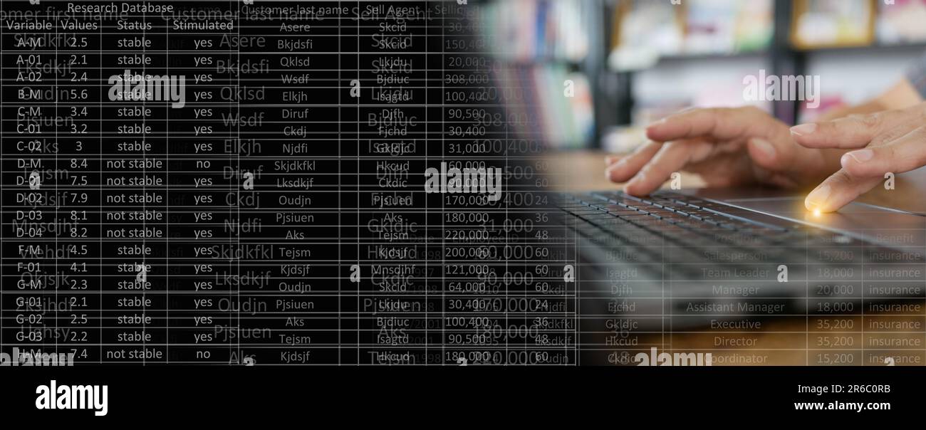 Data entry concept. A man is entering information or updating records in a database or computer system, or spreadsheet. Stock Photo