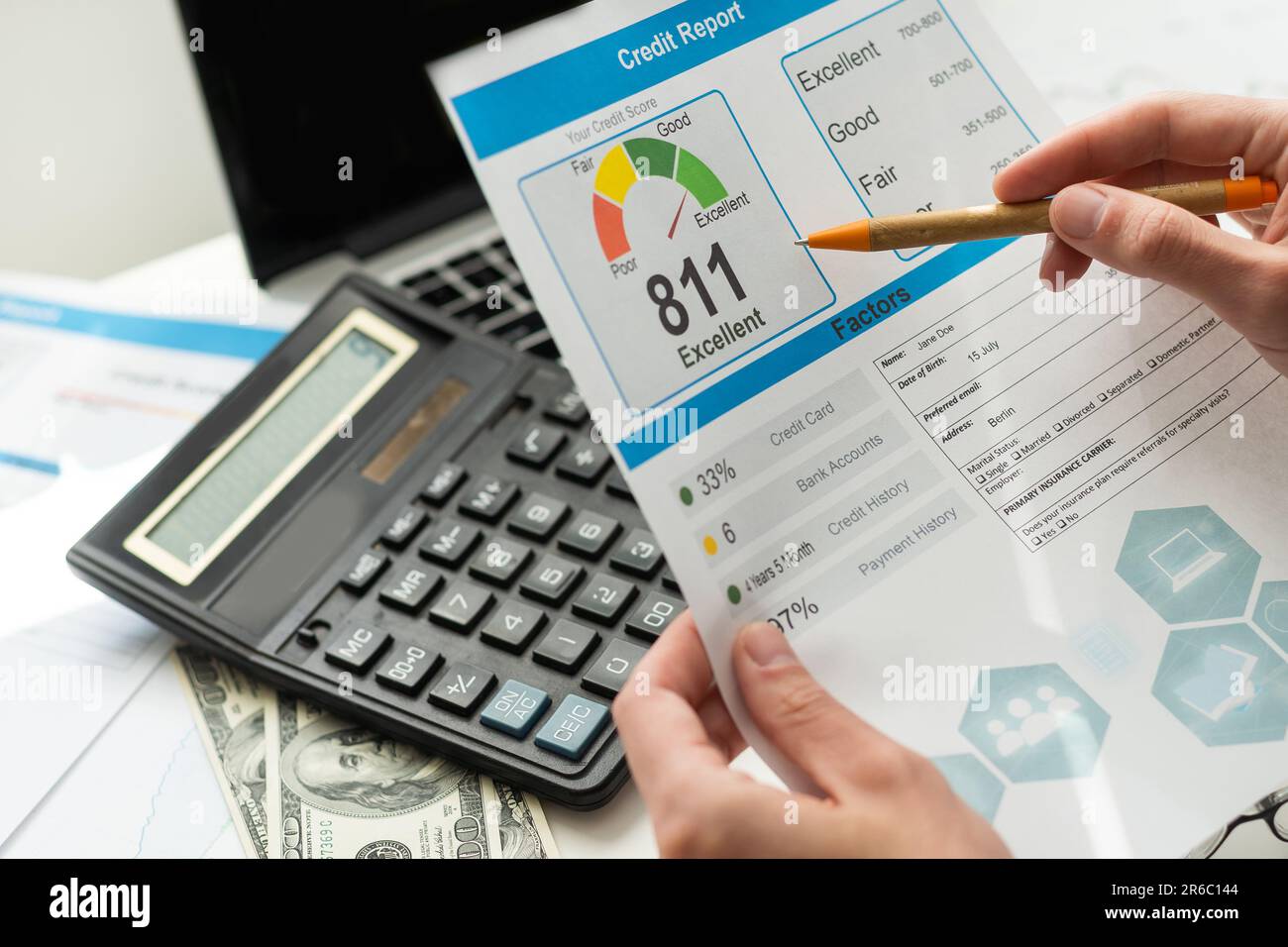 the-man-checks-the-credit-report-and-how-many-credit-points-stock-photo