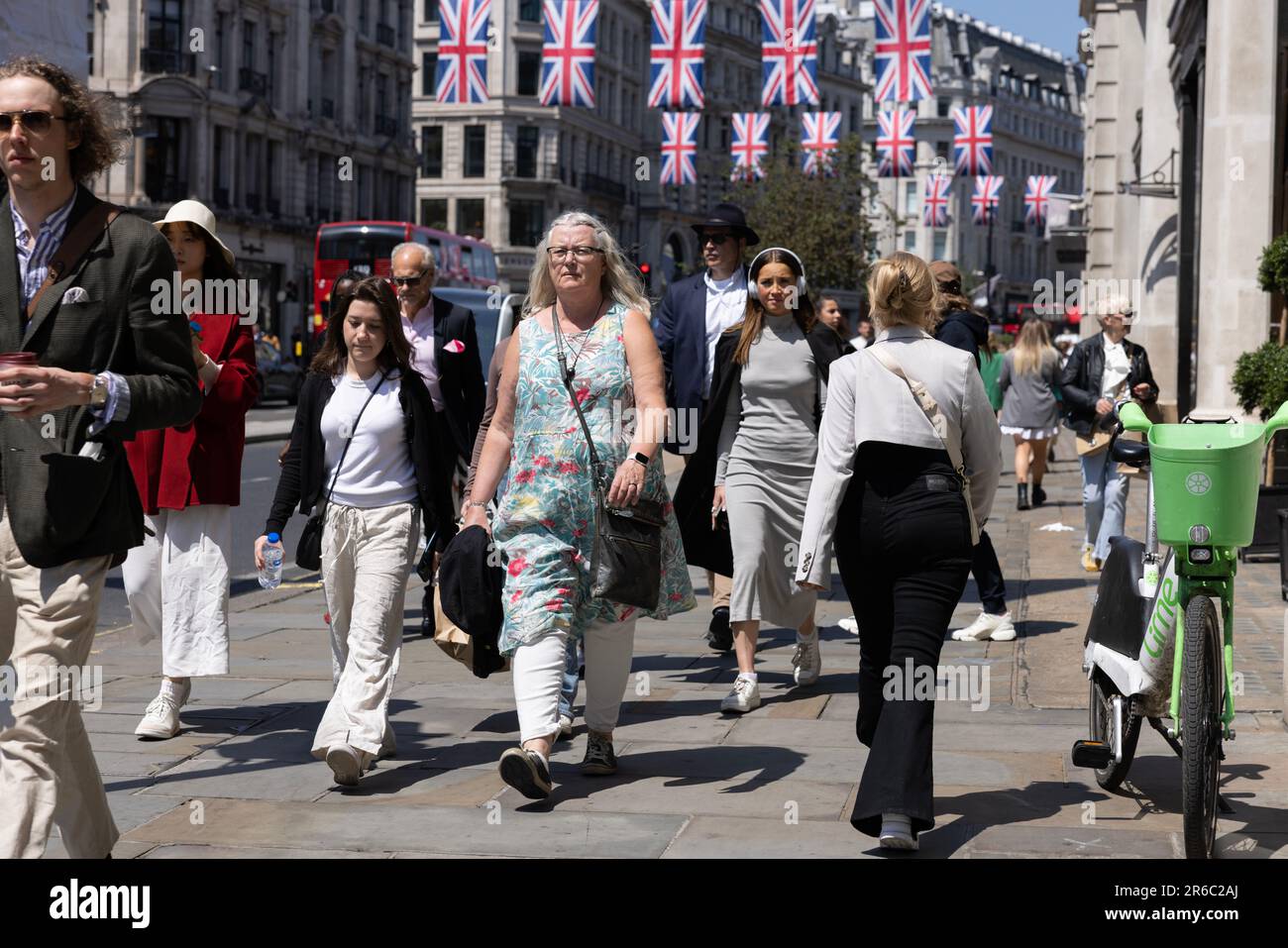 Street scene of tourists walking down Regent Street in London's West End, on a hot summers day, June 2023. Stock Photo