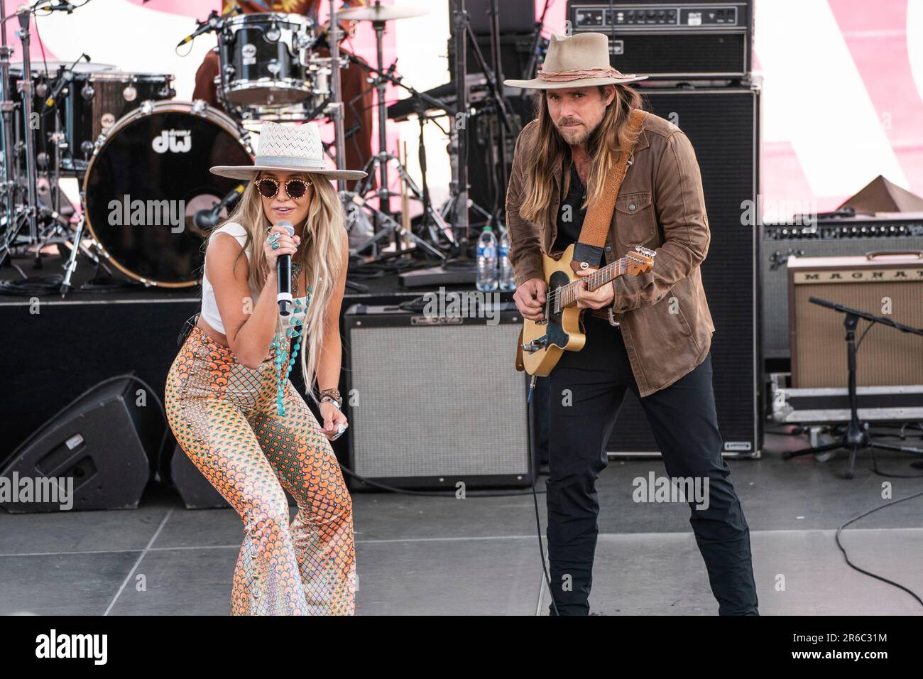 Lainey Wilson, left, and Lukas Nelson perform during the 2023 CMA Fest ...