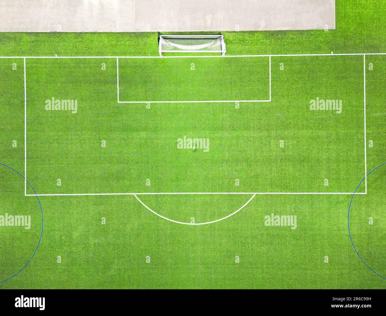 Overhead view of athe penalty area of a football pitch with synthetic grass. No peoiple. Stock Photo