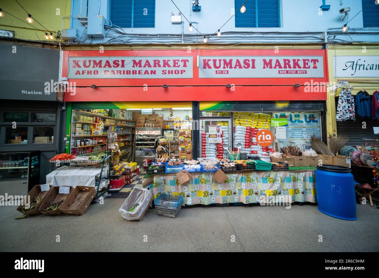 London- March 2023: Brixton Village, part of Brixton Market- an indoor hall of food stalls, bars and shops from multicultural inhabitants Stock Photo