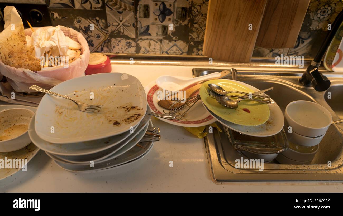 Selective focus of dirty dishes. Dirty dishes in the kitchen. Plates