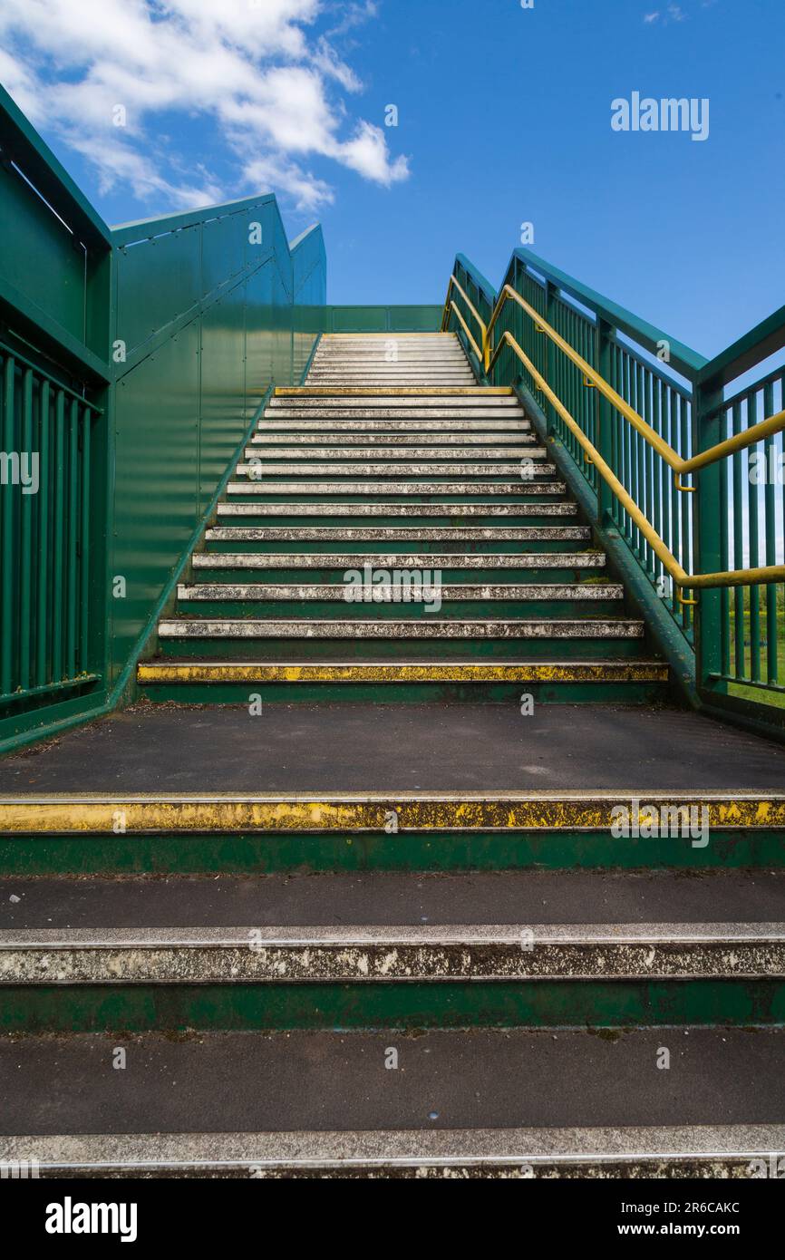 Steps leading to a railway footbridge, Magor, South Wales Stock Photo