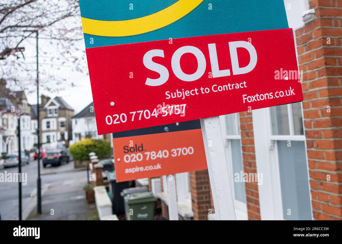 LONDON- MARCH, 2023: Estate Agent sold signs on residential street in ...