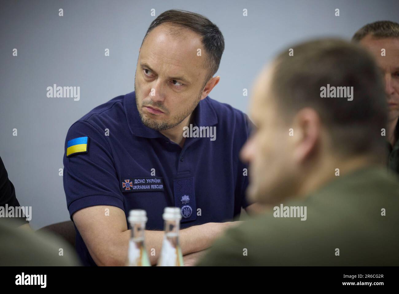 Kherson, Ukraine. 08th June, 2023. Ukrainian State Emergency Service head Serhiy Kruk listens during an emergency session of regional administration officials following massive floods caused by the Russian sabotaged Kakhovka hydroelectric power plant dam, June 8, 2023 in the Kherson, Ukraine. Credit: Pool Photo/Ukrainian Presidential Press Office/Alamy Live News Stock Photo